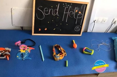 chalkboard and toys on a desk